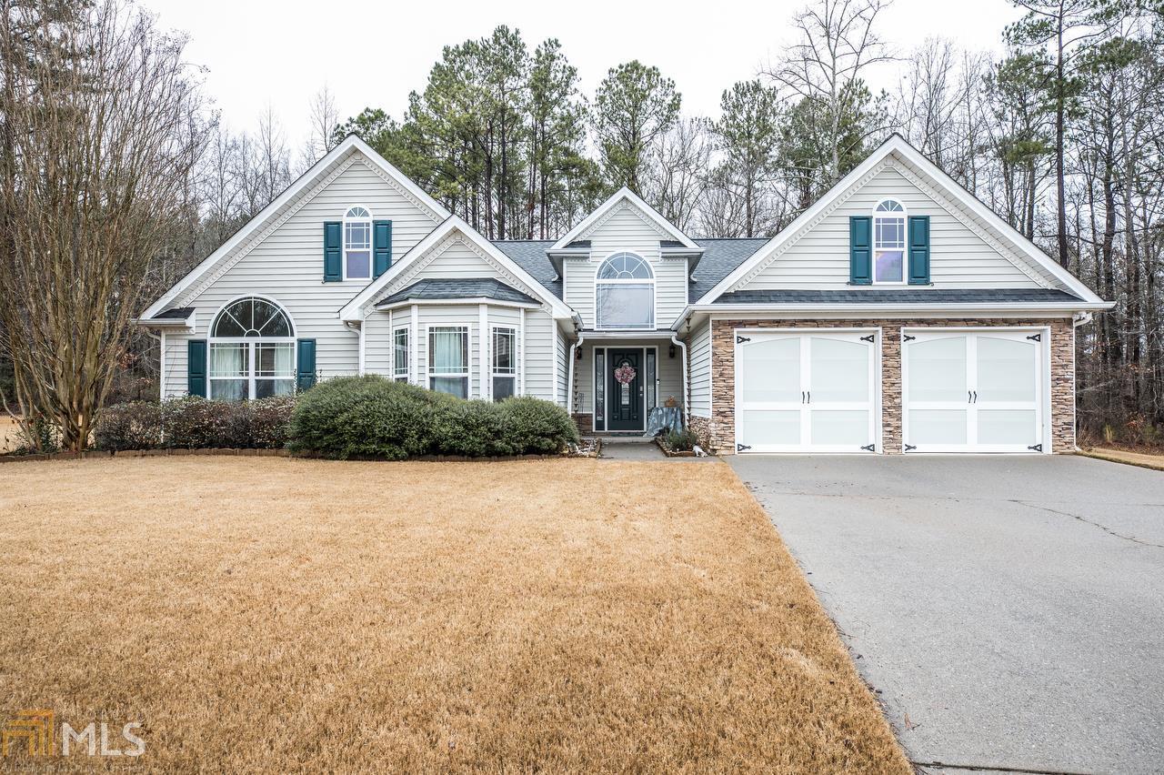 Don't miss this well maintained 3 bedroom 2.5 bath ranch home in much desired Reid Plantation! This home offers hardwood floors, large kitchen with separate dining, an oversized master bedroom complete with large fireplace, sitting room, and en-suite that boasts double vanities and whirlpool tub. Host your next family gathering in the large, private, and fenced in backyard. Enjoy summer evenings in the screened in sunroom or under the pergola. This won't last long!