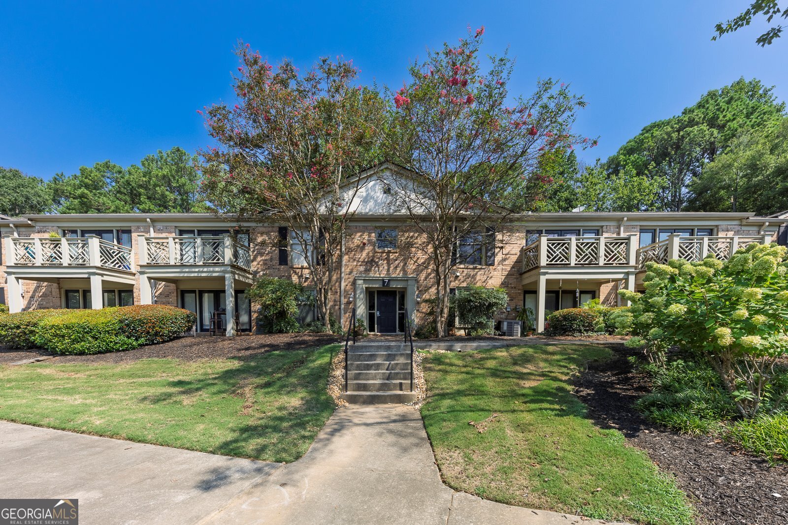 Welcome to this charming 2-bedroom, 1-bath condo nestled in a sought-after gated community in Brookhaven. Featuring laminate flooring throughout, this home offers an updated kitchen with granite countertops, custom back splash, plenty of cabinet space, and a seamless flow into the living area. Step outside to a covered patio overlooking peaceful wooded landscaping-perfect for relaxing or entertaining. Community amenities include a swimming pool, secure gated entry, and beautifully maintained grounds. Conveniently located near shopping, dining, parks, and easy access to major highways, this condo blends comfort, privacy, and convenience in one great package.