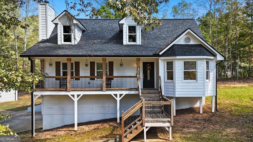 Location, Privacy, and Space-This One Has It All! Close to both Downtown Ball Ground and Downtown Jasper, this 4-bedroom, 3.5-bath home sits on a 1-acre lot with no HOA. The main level features a spacious dining room, a well-appointed kitchen with ample counter space and storage, and a cozy family room with an updated hearth. The roomy primary suite on the main offers a walk-in closet, dual vanities, soaking tub, and separate shower.  Upstairs includes two large secondary bedrooms, both with walk-in closets and a shared Jack-and-Jill bath. All upstairs windows have been recently replaced for improved energy efficiency.  The fully finished terrace level is perfect for entertaining and includes a large media room (wired for multiple TVs), a kitchenette, guest bedroom, and a full bath. Enjoy outdoor living with a new front porch, covered back porch, and a leveled side yard ideal for a firepit and play area. A detached 2-car garage provides additional storage or workshop space. Recent updates include a new roof, gutters, and downspouts.  This move-in ready home offers the perfect combination of convenience, comfort, and privacy!