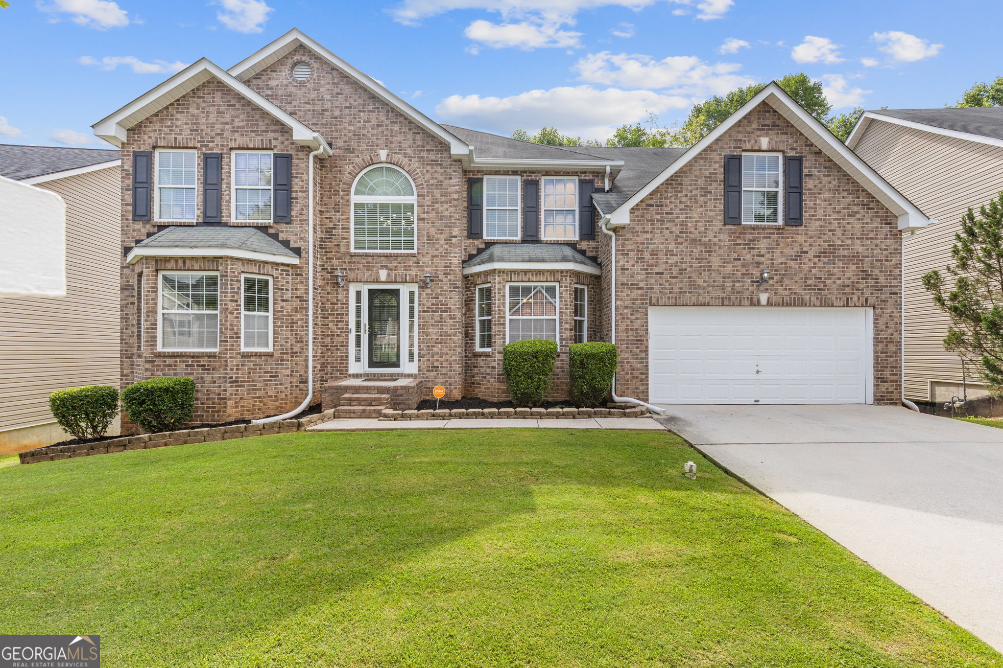 Welcome to one of Ellington Springs' rare finished daylight basement floor plans. This setup is perfect for multigenerational living, income potential, or simply spreading out and enjoying extra space. Seller has spared no expense adding valuable upgrades, new hot water, recessed lighting throughout, new tiling, new light fixtures throughout, rebuilt 2 story deck, newer A/C units and more! Upon entry on the main level you will find every bucket list request. Features include a spacious guest room with dual access bathroom , formal sitting room/ office, separate dining room for gatherings and laundry room. The open kitchen features stainless steel appliances and walnut cabinetry overlooking the family room. The family room features a cozy fireplace, creating a warm and inviting space for everyday living. Just off the kitchen, step outside to your NEW oversized double deck, perfect for grilling, dining, or relaxing. With no homes directly behind, you'll enjoy privacy and a peaceful backyard setting. Upstairs offers three generously sized secondary bedrooms that share a full bathroom. Enter into the beautiful spacious primary suite featuring high vaulted ceilings, a cozy fireplace, a separate sitting area & spacious ensuite bath with a garden soaking tub and separate shower with a large walk in closet. The finished daylight basement adds even more value boasting over 1500 sq ft, complete with one bedroom, a full bathroom, two bonus rooms, perfect for an office, gym, or media space and a kitchenette/bar area that can be converted to a full kitchen. With private exterior access, this level functions perfectly as a separate apartment or in-law suite. This is one of the few basement homes in Ellington Springs, offering space, privacy, and versatility that's hard to find. Don't miss your chance to make it yours. SELLER IS MOTIVATED AND OFFERING CONCESSIONS FOR CLOSING COST/ RATE BUY DOWN Schedule a showing today!