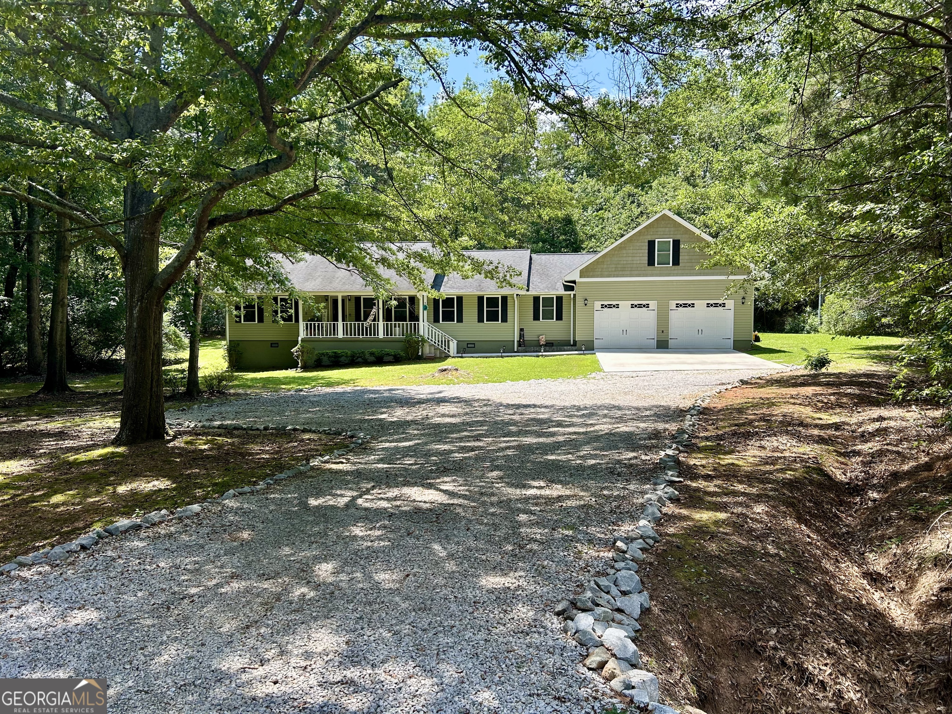 Check out 151 Evergreen Lane, a beautiful home in Hart County. This spacious home features 3 bedrooms, 2.5 Baths, and a bonus room over the garage, providing ample space. The family room, dining area, and kitchen flow seamlessly together, creating a perfect space for family and entertaining. The kitchen is equipped with stainless steel appliances, lots of counter and cabinet space, and a breakfast bar, featuring style and functionality. The master suite features a large garden tub, double vanities and a walk- in shower, providing a peaceful retreat. Upstairs you will find a large room that could be perfect for recreation, an office, or use as a fourth bedroom. Situated on almost three acres, this property offers a perfect blend of privacy and convenience. Conveniently located just minutes from Downtown Historic Hartwell, close to many boat launches and State Parks,with easy access to I85 make this a desirable location. Don't miss out on this beautiful home offering the perfect blend of location, comfort and style! Call today!