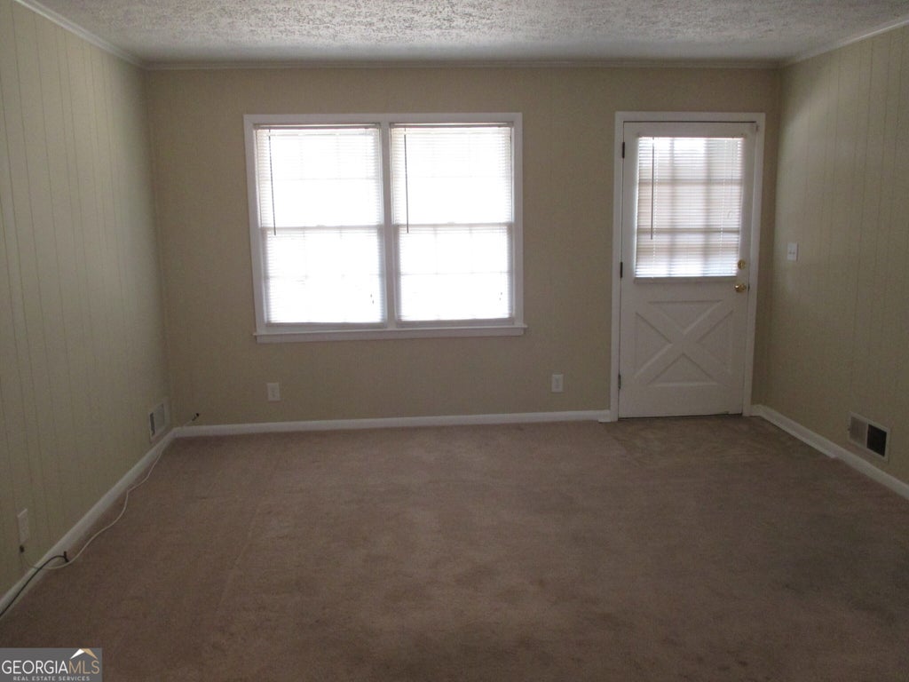 Photo of 8247 Spillers Drive SW, Covington, GA 30014 (MLS # 10777639)