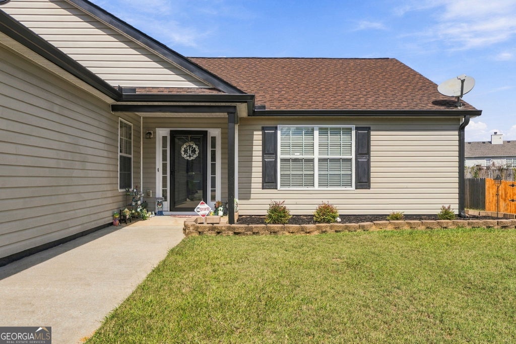 Photo of 255 Galway Ln, Hampton, GA 30228 (MLS # 10874797)