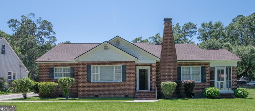 This home is a beauty. It was recently remodeled in 2025 and features a 900 sq ft. room with vaulted ceiling that houses a 10,000 gallon indoor, inground pool, with slab foundation, two levels and tiled with built in steps into the pool. It has surround sound speakers for your enjoyment, ceiling fans, and for year around comfort, it has a Natural Gas Heated brick fireplace.  Just off from the pool room is a metal roof covered full functional outdoor kitchen and a wood burning stone fireplace. It has 2 natural gas lines for encounter grills & two side burners, also a small sink, outdoor ceiling fans w/lights, and a stone countertop. Should I say more? Oh yea, it has 3 BR, 1-1/2 Bath, Upstairs office in the loft, gas burning fireplace in the den, and one in the bedroom. Original wooden doors and knobs, with transoms over the doors. The  roof was replaced in 2024.  Also a 12 X 22 shed and a 18 X 20 Carport that's securely fastened to the ground. You have a rear entrance and a shared driveway from the street.You've got to see this one. Don't let it get away.