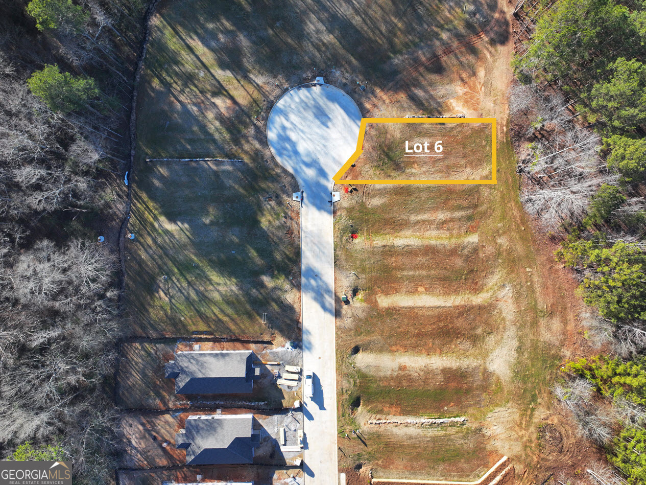 Rivers Edge is located just a stone's throw from Downtown Franklin, GA and the Chattahoochee River. This is Lot 6. This community is conveniently located to major cities such as LaGrange, Carrollton, and Newnan, GA. This property is planned for public sewer & water, as well as paved driveway. Lot purchase must accompany a contract to build a home. With multiple plans to choose from, you're sure to find your dream home! See standard disclaimers in attached documents. Contact Listing Agent for more details.