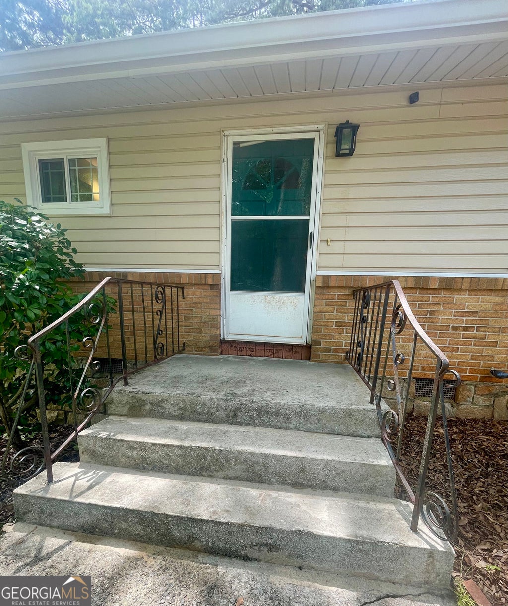 Photo of 1537 Sagewood Circle, Stone Mountain, GA 30083 (MLS # 10786436)