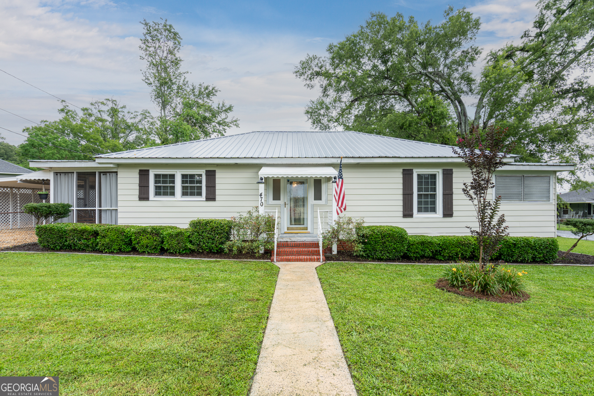Welcome home to this beautifully updated 2-bedroom, 2-bath charmer! Step inside to an oversized, stylish living room that flows seamlessly into the dining area and kitchen. Fresh interior paint and major system updates in 2019-including HVAC and electrical-mean peace of mind for years to come. The thoughtful layout creates a warm, inviting feel throughout. Outside, enjoy a fenced-in backyard that's perfect for kids or pets, plus a handy storage building. Need an extra bedroom? The dining room is conveniently located off the guest bath and could easily be converted into a third bedroom. Don't miss this versatile and move-in-ready gem!