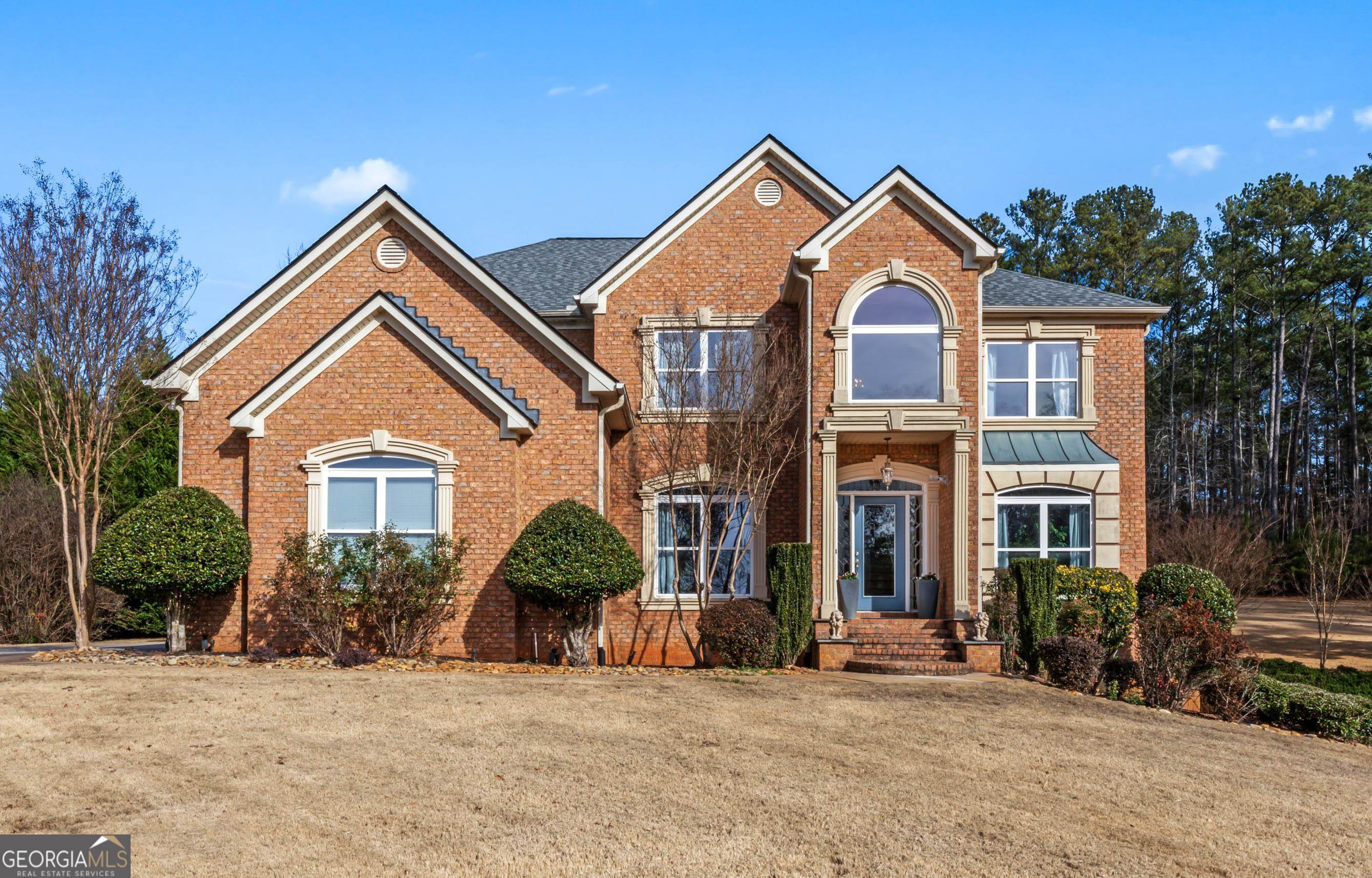 BACK ON THE MARKET! Welcome home to 2701 Ivy Circle, one of the Oaks @ Haynes Creekas leading floor plan designs. If you are a serious homebuyer, I've got a serious seller. Motivated and ready to go! This stunning home offers both exquisiteness and charm all under one large roof. With six bedrooms, six and a half bathrooms, this home encompasses all youave been longing for in an abode. Commencing from the moment you arrive you are met by an attractively manicured 2.03 acres of land. As you pull into the lengthy side entry driveway, you select from three car bays in which you can park your vehicle. Or park in one of the eight to ten available parking spaces in the driveway. Once you enter the front door you are adorned by professionally sculptured and rounded arches, hardwood flooring on the entire main level, and an uncluttered layout with plentiful crown molding. Residential exquisiteness in short is what this home offers. The two-story foyer opens to an elegantly positioned stairway with authentic wood steps and a wrought iron railway. To the right of the foyer is large open bright formal living room and to the left, a large formal dining room, both showing off crown molding, arches galore and design appeal. The kitchen boasts an oversized island, tall kitchen cabinets with upper crown molding, stainless steel appliances and upgraded granite countertops. Simply put, this kitchen is a chef or cookas dream. The keeping room features a stylish floor to ceiling stone-surround fireplace and, there are three additional fireplaces in this home that offer different attractiveness. There is a Butleras pantry with real wood cabinets with glass window inserts, tile backsplash, and arches. The bedroom on the main level with on-suite access makes this room easily mistaken as the owneras suite but itas not. There is also a half bath on the main for guests. Walk up to the lavish stairway and there is a catwalk overlook into the family room. Also, upstairs you will find four oversized bedrooms each with their own private bathroom, to include the owneras suite. All secondary bedrooms, including the one on the first floor and the one in the basement can accommodate queen or king size bedroom sets. The owneras suite brags a double-sided gas starter fireplace, adding warmth and coziness. The crown molding and vaulted ceiling in the owneras suite is something to see. The owneras bathroom has a double vanity, walk in shower, jetted tub, design frosted window, framed mirror package, wall sconces, tile flooring and much more. The spacious walk-in closet makes it easy to keep this closet organized. The basement is a home by itself off to its own side of the basement. There is the 6th bedroom with a window, full bath and closet, making this the perfect in-law suite, teen suite or a classy and jazzy entertainment area. There is bar right off the separate sitting wing and next to the movie theater. There is an ingress/egress so if you want to entertain without people having to enter the private first or second floor of your home, they enter and exit through the basement. There are so many great attributes this home has to offer that it is literally too many to mention. This entire house has too much to mention in a single listing and must been seen for yourself. You would be doing yourself or your client an injustice if you do not see and make an offer on this listing.