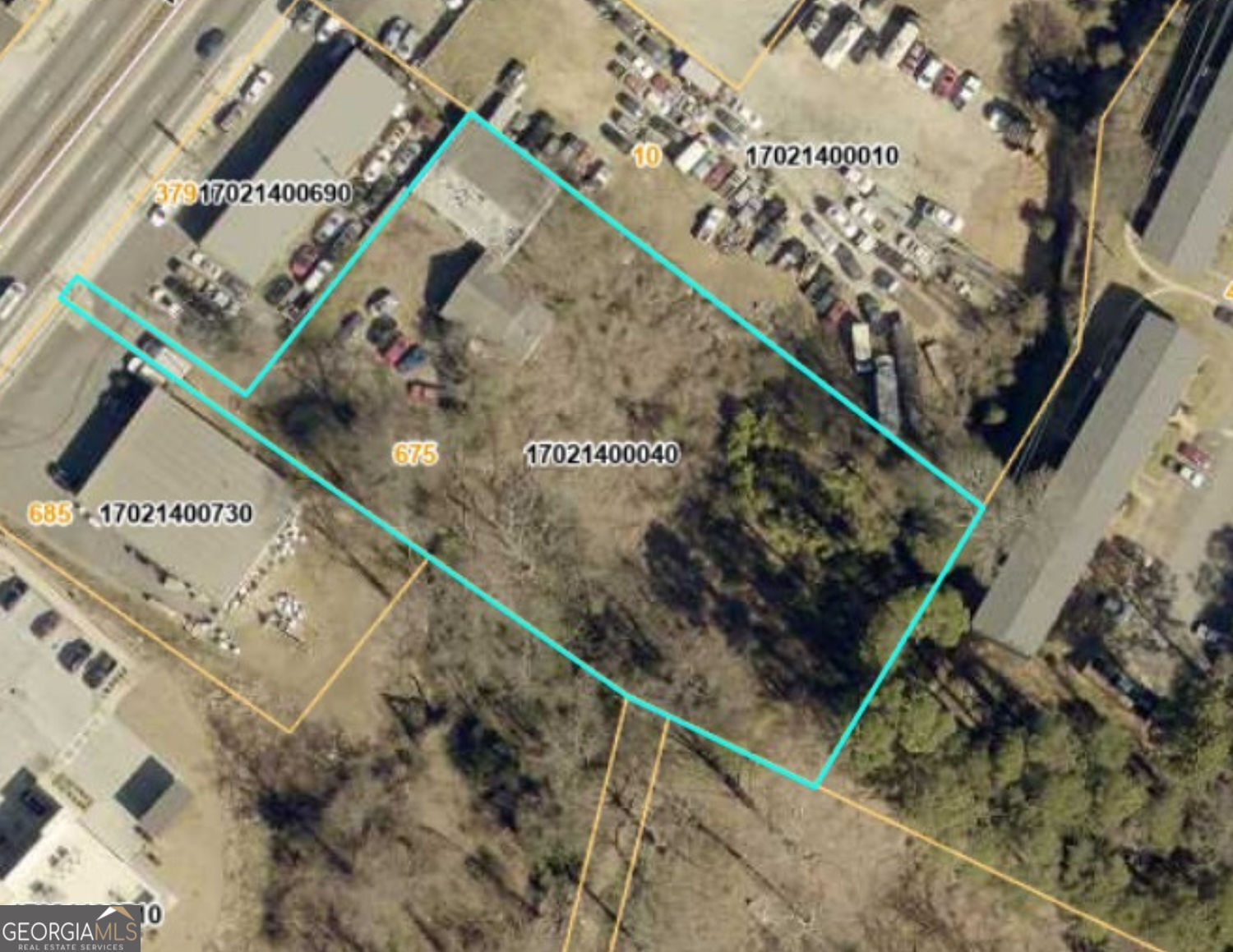 1.1 Acres Just 2 Miles from Marietta Square! 675 Powder Springs Street offers a rare redevelopment opportunity in the heart of Historic Marietta. Just two miles from the Marietta Square and positioned along a high-visibility corridor, this 1.1-acre site is perfectly suited for investors and developers seeking a prime location. The property currently features a 40' x 50' three-bay garage and a separate office building with reception, three offices, a large workroom, kitchen, one full bath, and one half bath. Both the Garage and office are in need of rehab. The rear portion of the property remains undeveloped, providing flexibility for expansion, new construction, or a complete reimagining of the site. Large parcels this close to Marietta Square are increasingly rare-don't miss your chance to secure a property with exceptional visibility and future potential. Sold as-is with no disclosures. Please contact the listing agent before visiting.