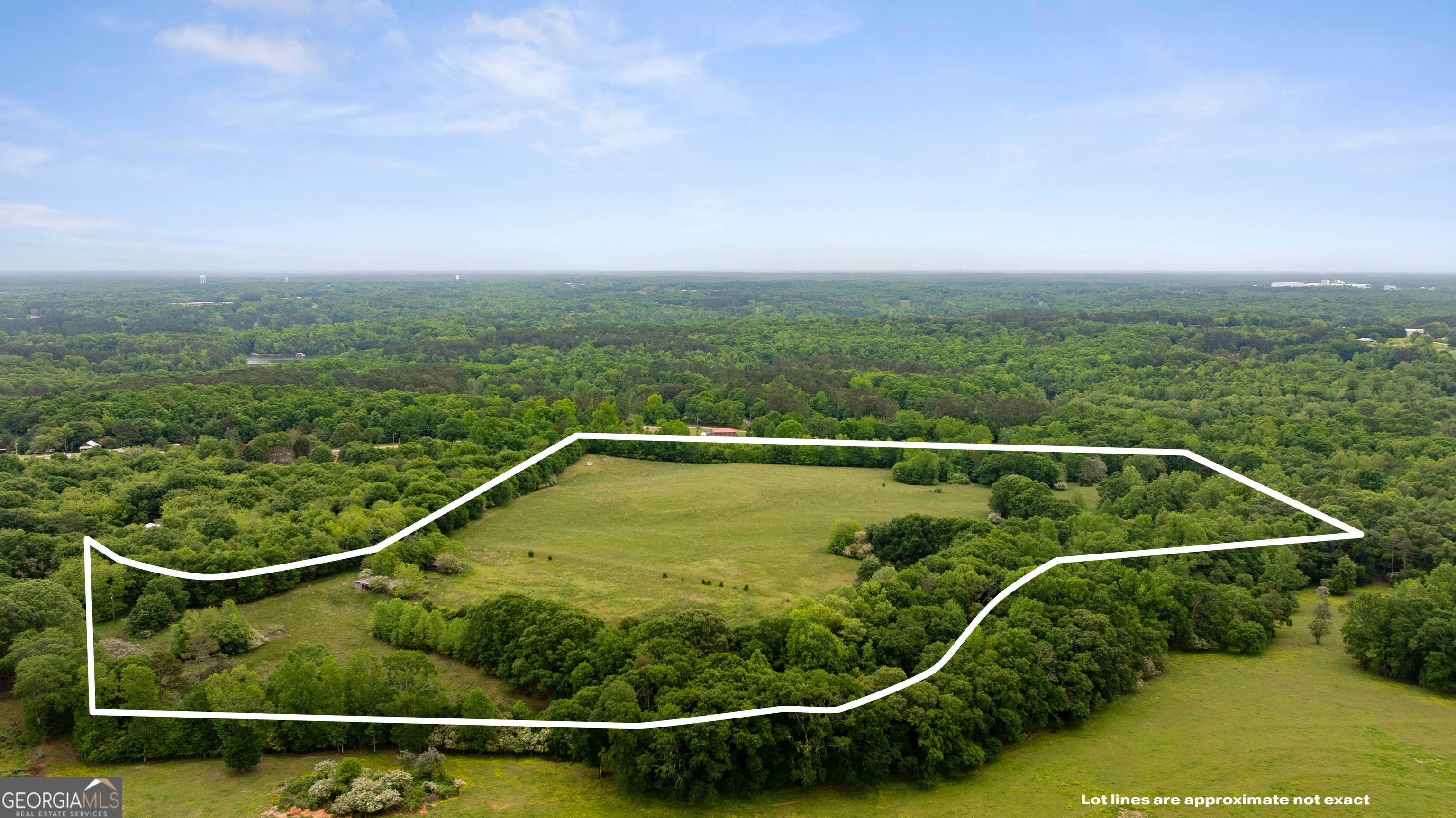 LOCATION!! LOCATION!! Stunning 36 ACRES located just 4 miles from downtown Hartwell. The prestigious property has endless possibilities. Fenced rolling pasture ready for cattle or could be turned into your family's next estate. The back property line borders the ARMY CORPS property and a flowing creek. The property lines are beautiful timber. The 36 acres offer privacy and seclusion while still being very conveniently located to downtown Hartwell. Well and power are installed on the property. Bring your side by side to start enjoying the farm life and all the sought-after Hartwell, Georgia, has to offer.