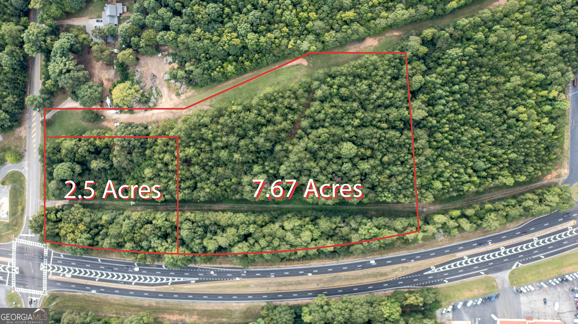 Only minutes away from the new Target warehouse near the Atlanta Motor Speedway in Hampton. The 2 1/2 acres is scheduled to have a gas station to be built on the corner. With access from both 19/41 and Birdie Rd, the possibilities are endless. This is a great opportunity for a developer to bring their vision to life in a high traffic location, perfectly located between Griffin and the speedway! 7.670 acres zoned Commercial ROAD FRONTAGE on HWY 19/41 and on Birdie Rd. Per GA DOT Traffic Data, this stretch of HWY19/41 has an average traffic count of 31,300 cars a day!!!