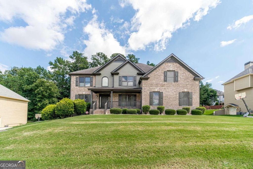 Photo of 1859 Alcovy Shoals Bluff, Lawrenceville, GA 30045 (MLS # 10722320)