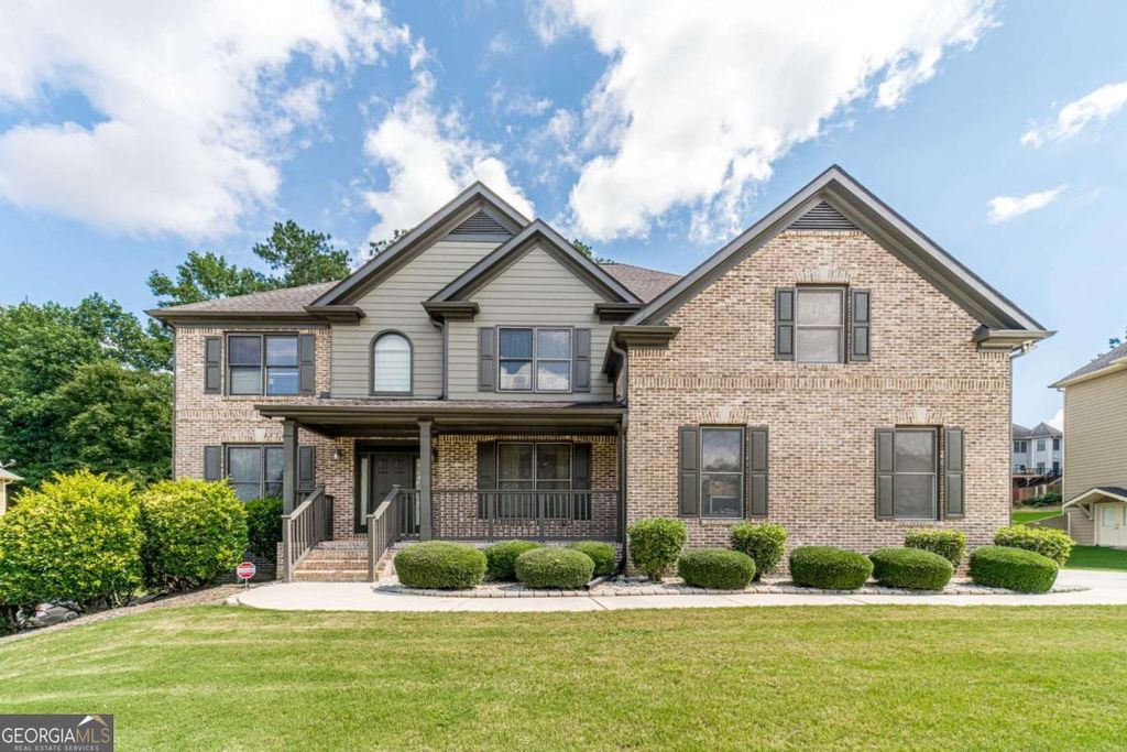 Photo of 1859 Alcovy Shoals Bluff, Lawrenceville, GA 30045 (MLS # 10722320)