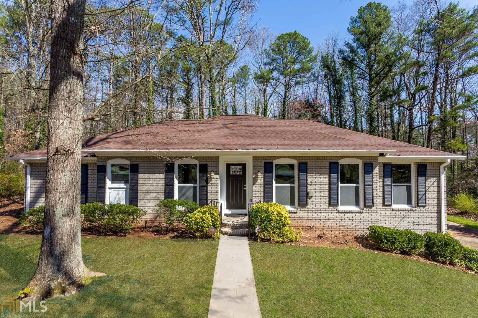 Looking for space to live and have rental income? Need an in-law suite? Looking for income producing rental property that is move-in ready? THIS IS IT!! Rare beautiful remodeled 4 side brick ranch on basement with 4 BR and 2 BA on main level and a full finished daylight/walk-out basement apartment with 3 BR and 1 BA. Two full kitchens with SS appliance, granite/quartz countertops, hardwood flooring, 2 fireplaces, appliances on both levels. Perfect for multi-generational families or AirBNB. Large detached 2 car garage with tons of storage and plenty of additional parking space. Quiet cul-de-sac lot convenient to Tucker, Stone Mountain, Decatur, downtown ATL. Easy commute to Indian Creek Marta Station.