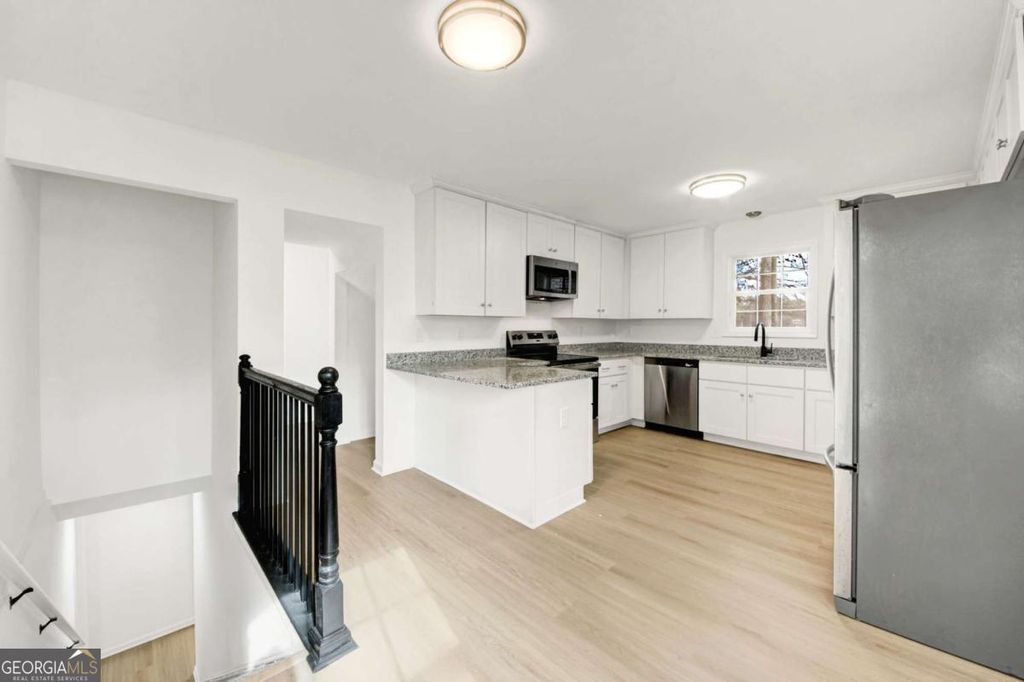 Photo of 854 Mundys Mill Road, Jonesboro, GA 30238 (MLS # 10687185)