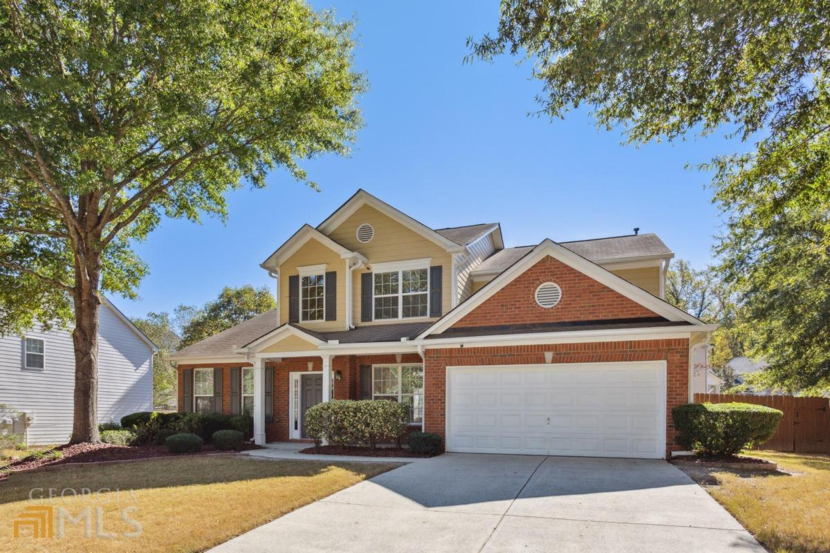 Location! Location! Location! This is a fabulous opportunity for this well-maintained, 4 bedroom, 2.5 bathroom home in Glenlocke Grove Subdivision with a primary bedroom on the main. Easy access to interstates and airport. Minutes to shopping, dining, Westside Reservoir Park, Silver Comet Trail, The Battery/Truist Park (Home of the World Series Champions- Atlanta Braves!), shops, restaurants, parks, and more! Updated throughout with New Kitchen, New HVAC, New exterior siding, landscaping, and garden. Open concept floorplan with gorgeous hardwood floors throughout the main level. Kitchen with granite countertops, stainless steel appliances, and tile backsplash. Generous-sized two-story great room with fireplace. Primary En-suite on the main level. Spacious secondary bedrooms, bathrooms, and closets. Lots of windows throughout, offering tons of natural light. Tranquil beautifully landscaped outdoor space perfect for entertaining or relaxing. Move-in ready with all appliances included - washer and dryer tooCa Home Sweet Home!