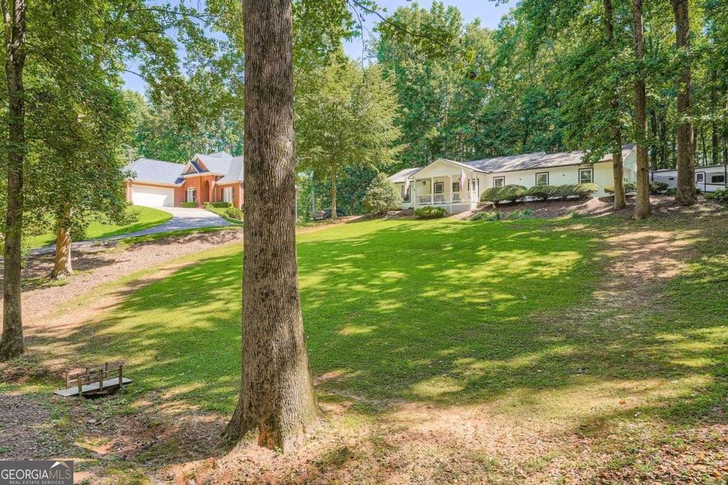 Photo of 206 EAGLES NEST Drive, Canton, GA 30115 (MLS # 10708517)