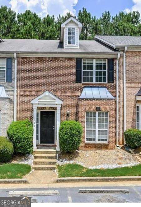 Welcome home to this inviting 2-bedroom, 2.5-bathroom townhome located in the sought after Stonecrest Townhomes community of Austell. This well maintained residence offers a comfortable and convenient lifestyle, perfect for first-time homebuyers, a small family, or those seeking a low-maintenance living solution. Step inside to discover a bright and spacious layout, thoughtfully designed for modern living. The main level features an open concept, seamlessly connecting the living areas. Cozy up by the fireplace in the family room, perfect for chilly evenings. The eat-in kitchen boasts a breakfast bar and ample cabinet space, making meal prep and casual dining a breeze. Upstairs, you'll find two generously sized bedrooms, each offering privacy and comfort. With 2 full bathrooms upstairs and a convenient half-bath on the main level, this home ensures comfort for residents and guests alike. Enjoy the benefits of community living with street lights throughout the neighborhood. The location is truly unbeatable - just minutes away shopping, dining options, and entertainment. Outdoor enthusiasts will enjoy easy access to the scenic Silver Comet Trail, perfect for walking, biking, and enjoying nature. Don't miss the opportunity to own this fantastic townhome in a prime Austell location. It's more than just a home; it's a lifestyle!