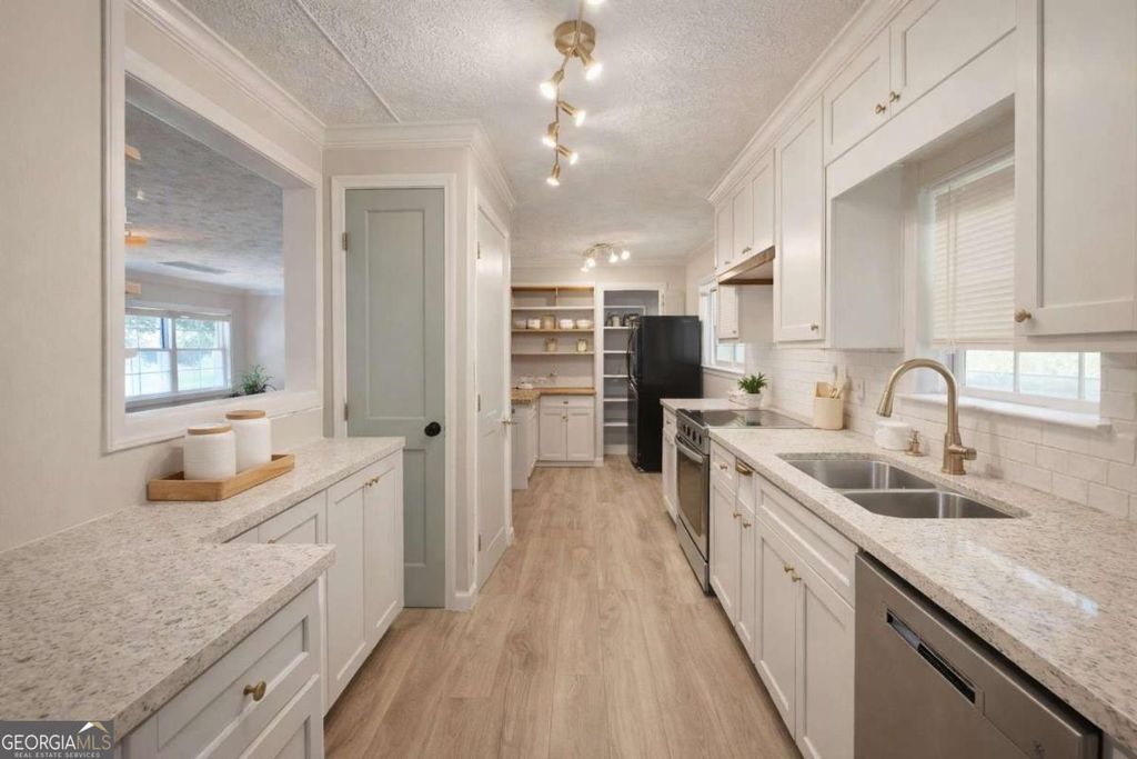 Photo of 6305 Eidson Drive, Cumming, GA 30041 (MLS # 10673182)