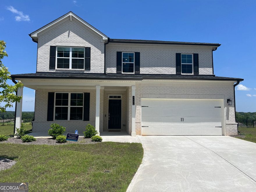 Where Your Next Chapter Begins - Welcome to Bedford Estates! Tucked at the end of a peaceful cul-de-sac in the sought-after Bedford Estates community, this stunning 5-bedroom, 4-bath home-newly built in 2023-is more than just a house; it's the start of your next story. Step into the entry foyer, where natural light dances off rich luxury hardwood floors that flow seamlessly throughout the main level. The open concept design is ideal for both quiet evenings and lively gatherings. At the heart of the home, the spacious kitchen is a dream come true with granite countertops, a kitchen island, gas range, stainless steel appliances, and a walk-in pantry that keeps everything organized and close at hand. The eat-in dining space is generous enough for a full-size table, and just steps away, your rear patio awaits-perfect for grilling out or enjoying your morning coffee. The family room invites you to unwind by the fireplace, surrounded by abundant windows that flood the space with natural light. Also on the main level is a flexible bedroom, ideal for a home office, guest suite, or creative studio. Upstairs, you'll discover a secondary living area, perfect as a media room, teen lounge, or quiet reading nook. The primary suite is a true retreat, with a spa-like bath featuring dual granite vanities, a garden tub, separate shower, and an expansive walk-in closet. Three additional spacious bedrooms, a full bath, and a convenient upstairs laundry room complete the upper level. Outside your front door, Bedford Estates offers community amenities including a pool, tennis courts, a park, and sidewalk-lined streets perfect for morning jogs or evening strolls. And when it comes to location, it doesn't get much better-just 15 minutes from Hartsfield-Jackson Atlanta International Airport, 20 minutes to Downtown Atlanta, and a quick 5-minute drive to Camp Creek Marketplace, where you'll find Target, Publix, Starbucks, LA Fitness, UPS, and more. Blending modern design, versatile living space, and unbeatable convenience, this home isn't just ready for move-in-it's ready for you. Come see where comfort, style, and community come together.