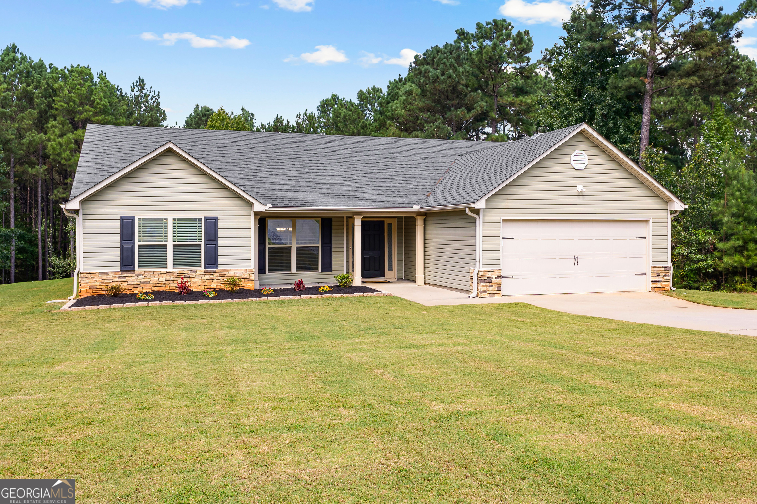 Welcome to your peaceful retreat just minutes from downtown Senoia! This 4 bedroom, 2 bath ranch sits on 1.3 acres in a quiet neighborhood with no HOA. With 1,840 square feet all on one level, the freshly painted home with new flooring throughout features a functional layout with plenty of natural light, a spacious kitchen, and flexible bedrooms that can serve as guest rooms, office space, or playrooms. Step outside and enjoy the wide-open yard, perfect for gardening, pets, or outdoor living. The large lot offers privacy and freedom without restrictive HOA rules.