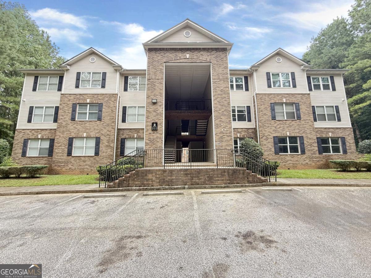 Charming condo in Fairington Village, Lithonia Discover comfortable living in this 1,202 sq ft condo featuring 3 bedrooms and 2 bathrooms, located in the desirable Fairington Village neighborhood. Enjoy easy access to schools, shopping, dining, and entertainment, as well as major thoroughfares like I-20, I-285, and U.S. 278. Property highlights: Spacious interior: Features include a generous living room and kitchen. Convenient layout: This single-story condo, built in 2003, offers easy living with no stairs. Central location: Close to nearby schools, including Flat Rock Elementary, Lithonia Middle, and Lithonia High Schools. The well-maintained structure provides an excellent foundation for value-enhancing improvements. Strategic updates and thoughtful renovations can significantly increase equity while creating a customized living environment. The combination of desirable location, tranquil wooded views, practical ground-level access, and strong renovation potential makes this property an compelling opportunity for investors and homeowners seeking both immediate comfort and long-term value appreciation. Schedule your viewing appointment today to see how this contemporary condominium s clean lines, updated features, and convenient location create an ideal living environment for your lifestyle. *****This property has been placed in an upcoming event. All bids should be submitted at Xome.com void where prohibited. Please submit any pre-auction offer received through the property details page on Xome.com. Any post-auction offers will need to be submitted directly to the listing agent. Response within 3 business days. All properties are subject to a 5% buyer s premium pursuant to the Auction Participation Agreement and Terms & Conditions minimums will apply.