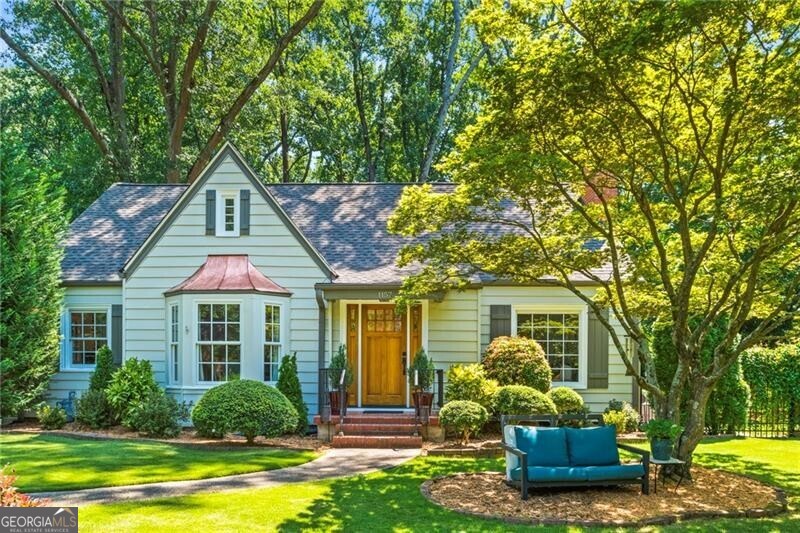 Set on an oversized 90 ft x 201 ft lot in the heart of Virginia-Highland, this charming 3-bedroom cottage offers timeless character and rare outdoor space. A sun-drenched sunroom, provides the flexibility to serve as a fourth bedroom, office, or additional living space. Inside, warm and inviting interiors flow effortlessly for comfortable living and easy entertaining. The lush, half-acre lot features mature landscaping, a private patio, and a tranquil backyard retreat-perfect for morning coffee or dining al fresco. With a full unfinished basement for storage or future expansion, and just minutes from the BeltLine, parks, and neighborhood favorites, this home is a rare blend of charm, space, and location.