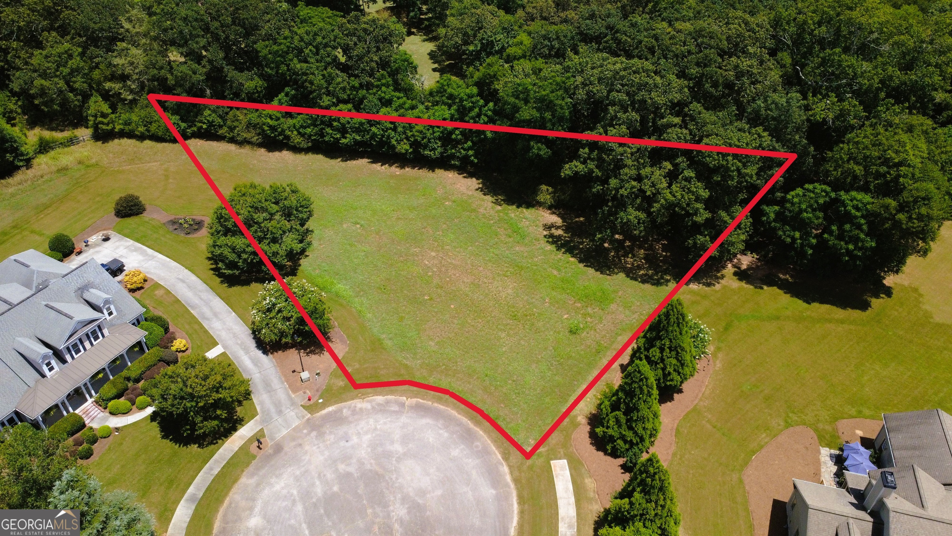 Build your dream home in one of Madison's most desirable neighborhoods! This 0.94-acre level lot is perfectly situated at the end of a quiet cul-de-sac within Madison Lakes gated community. Offering the ideal blend of privacy and community living, this lot is ready for your custom home design.