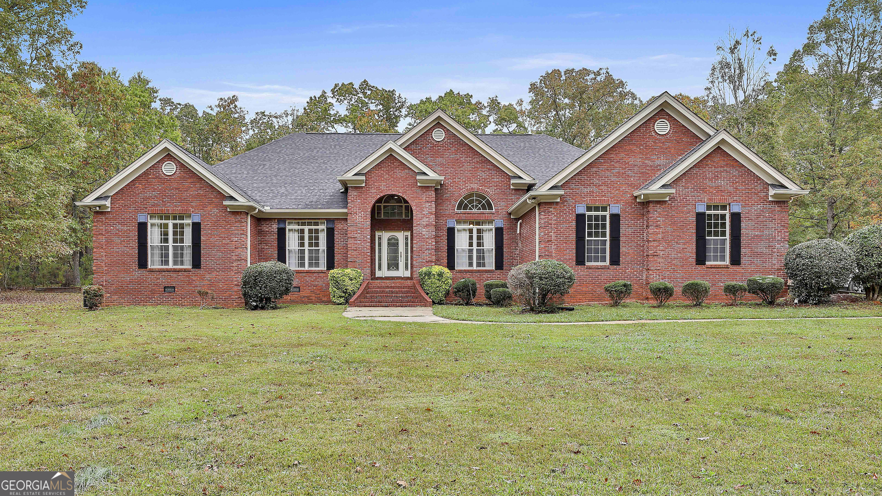 Welcome to this stunning 4-bedroom, 3.5-bath custom home tucked away on 8.59 serene acres in Hampton, Georgia. Boasting 3,742 square feet of thoughtfully designed living space, this estate offers the perfect balance of luxury, comfort, and functionality. Step inside to a spacious and inviting floor plan featuring multiple living and dining areas, a large kitchen, and generously sized bedrooms-ideal for families, entertaining, or multigenerational living. Natural light floods the home, highlighting the timeless finishes and attention to detail throughout. Step outside to your own private oasis: a beautiful inground pool, perfect for relaxing or hosting summer gatherings, complemented by a fully equipped pool house for guests or extra entertaining space. Need space for hobbies or storage? The property also includes a large workshop, offering endless possibilities for DIYers, business owners, or outdoor enthusiasts. With 8.59 acres of open and wooded land, there's plenty of room for recreation, gardening, animals, or even future expansion. Located just minutes from downtown Hampton and convenient to shopping, dining, and schools-this is country living without sacrificing convenience. Don't miss your chance to own this rare gem-schedule your private tour today!