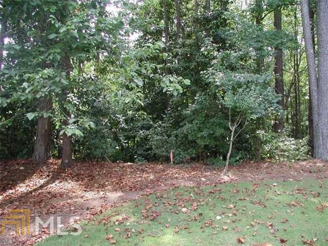 Your dream begins here on this beautiful, one acre+ cul de sac home site. Under the guidance of Foyer Custom Homes you're offered an incredible opportunity to create a luxury home of unparalleled beauty, quality and outstanding workmanship. This premiere Atlanta Country Club lot offers ample room for a pool or tennis court, wonderful garden space or just enjoy the serenity only nature can provide with beautiful hardwoods and native plants. Jump in the golf cart and it's just minutes from your front door to the front door of the club.