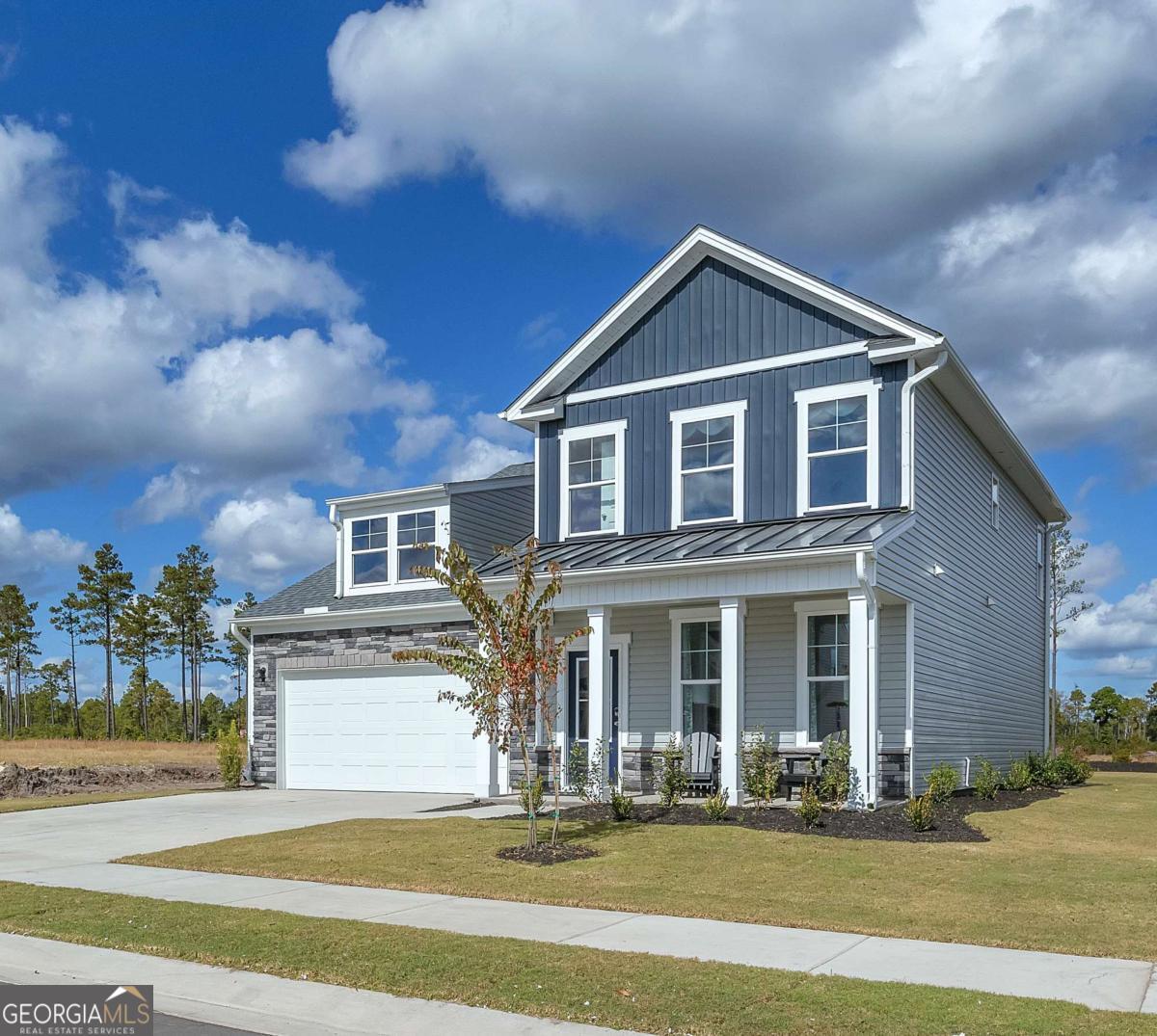 Welcome to Kinglsey at Lake Allatoona, the new Stanley Martin Community in Acworth, GA! LOT 72 - LAST BASEMENT HOME. Ask about the AMAZING builder incentives available - Up to 3% or interest rate buy-downs In the Fenton floorplan, you can mix and mingle with friends and family in your open-concept first floor, which includes a kitchen overlooking the family room and dining area. A bedroom at the front of the home can be used for guests to have their own private space. The covered front porch or rear patio provide the perfect spot to relax and enjoy your new home. Upstairs, the Primary suite boasts ample space, including a large walk-in closet off the on-suite bathroom with double vanities, walk-in shower and separate soaking tub. Additional bedrooms provide the perfect place for family or friends to rest their heads at night. Plus, take the chore out of doing the laundry with a conveniently located laundry room on the upper level! **Photos shown are of a similar home**