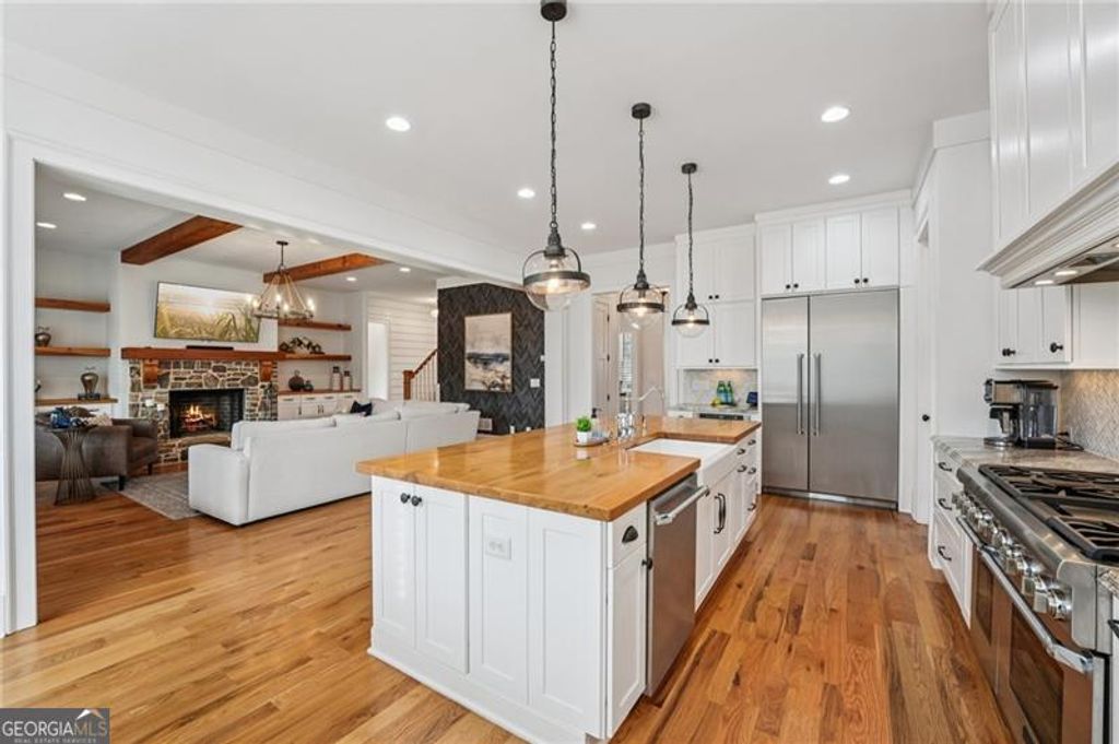 Photo of 203 Trinity Way, Canton, GA 30115 (MLS # 10669571)