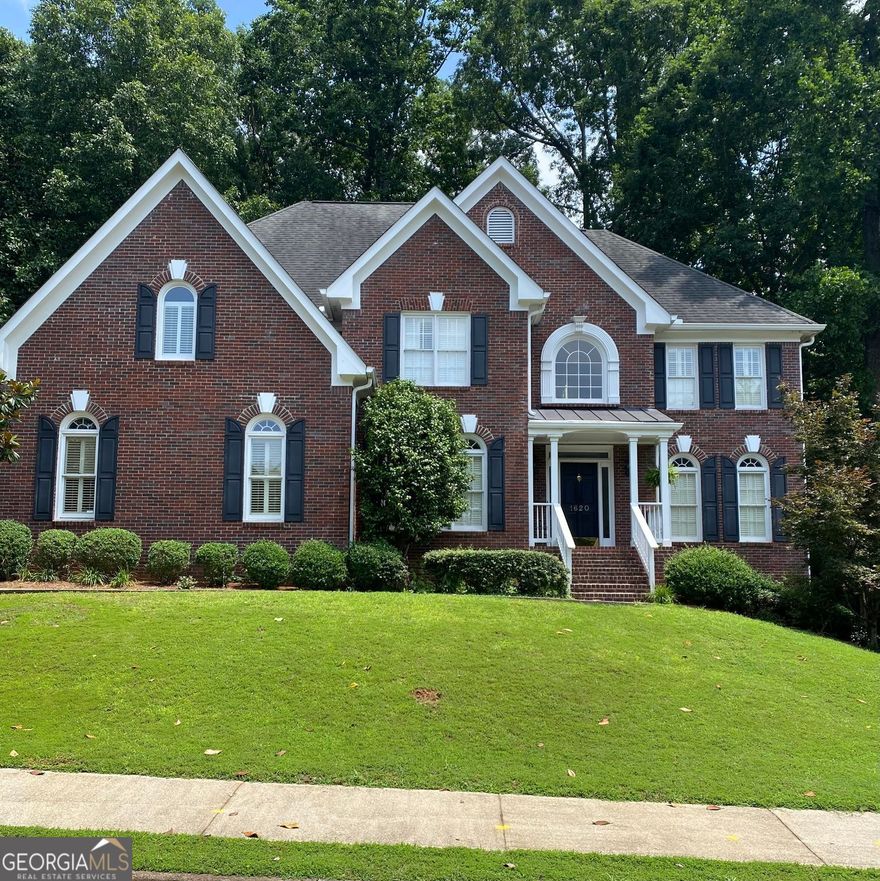 Beautiful brick traditional located in close walking distance to Park Glenn's Swim/Tennis facility and is a short distance from award winning, North Fulton County schools. Avalon, Downtown Alpharetta, Halcyon and the Greenway within easy reach. Home has a welcoming entry with hardwood floors, two story foyer leading to living room and separate dining room. First floor bedroom/office with French doors, palladium windows and adjoining full bath. The two-story charming family has French doors leading to a wonderful sunroom with lots of light coming through. The kitchen is light and bright, making it a pleasure to cook meals. Gas cooking, stainless steel appliances, stone counters, breakfast bar, pantry. Rear stairs lead to the very spacious primary suite with plantation shutters, a sitting area, trey ceiling, two separate bathroom vanities, storage or TV cabinet. Two other bedrooms with jack and jill bath. Upstairs laundry room with utility sink. Finished lower level with large entertainment room, bedroom, full bath and shower, exercise room and unfinished storage/equipment rm. Wonderful outside space, great for entertaining.