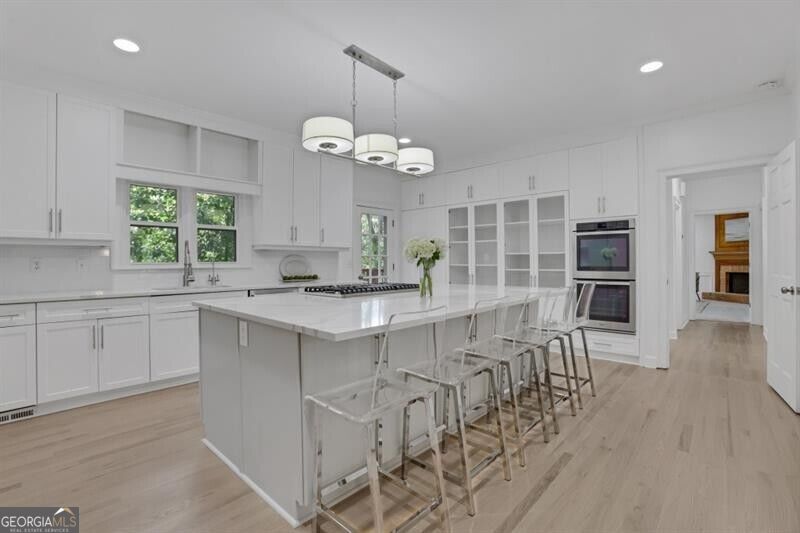 Photo of 8705 River Bluff Lane, Roswell, GA 30076 (MLS # 10876500)