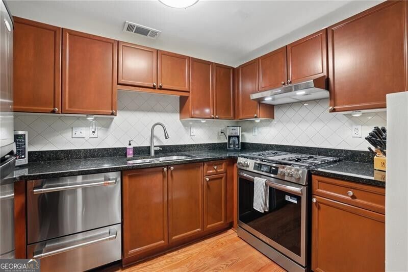 Photo of 4254 River Green Drive NW #611, Atlanta, GA 30327 (MLS # 10873608)