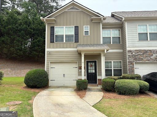 Welcome to this beautifully maintained 2-bedroom, 2.5-bath end-unit townhome, ideally located on a quiet cul-de-sac in the desirable Lanier Walk community. Just minutes from Lake Lanier and the vibrant shops and restaurants of Cumming, GA, this home offers the perfect blend of comfort, convenience, and outdoor lifestyle. Step inside to a like-new interior with a spacious, open-concept layout. The main level features a flexible dining area that can also serve as a home office, a well-appointed kitchen with a breakfast bar, and a large family room-perfect for entertaining or relaxing. Upstairs, you'll find two generously sized bedrooms and well-designed baths for added comfort. Enjoy your private, fenced backyard-ideal for outdoor dining, gardening, or unwinding in peace. The 1-car garage adds convenience and additional storage and parking. HOA amenities include: All common area maintenance & utilities, Liability insurance, Termite coverage, Exterior dwelling repairs & maintenance, Trash pick-up. With its prime location, thoughtful design, and move-in-ready condition, this home is a true gem in Lanier Walk. Don't miss this opportunity!
