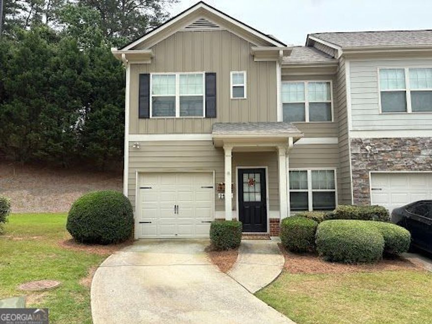 Welcome to this beautifully maintained 2-bedroom, 2.5-bath end-unit townhome, ideally located on a quiet cul-de-sac in the desirable Lanier Walk community. Just minutes from Lake Lanier and the vibrant shops and restaurants of Cumming, GA, this home offers the perfect blend of comfort, convenience, and outdoor lifestyle. Step inside to a like-new interior with a spacious, open-concept layout. The main level features a flexible dining area that can also serve as a home office, a well-appointed kitchen with a breakfast bar, and a large family room-perfect for entertaining or relaxing. Upstairs, you'll find two generously sized bedrooms and well-designed baths for added comfort. Enjoy your private, fenced backyard-ideal for outdoor dining, gardening, or unwinding in peace. The 1-car garage adds convenience and additional storage and parking. HOA amenities include: All common area maintenance & utilities, Liability insurance, Termite coverage, Exterior dwelling repairs & maintenance, Trash pick-up. With its prime location, thoughtful design, and move-in-ready condition, this home is a true gem in Lanier Walk. Don't miss this opportunity!