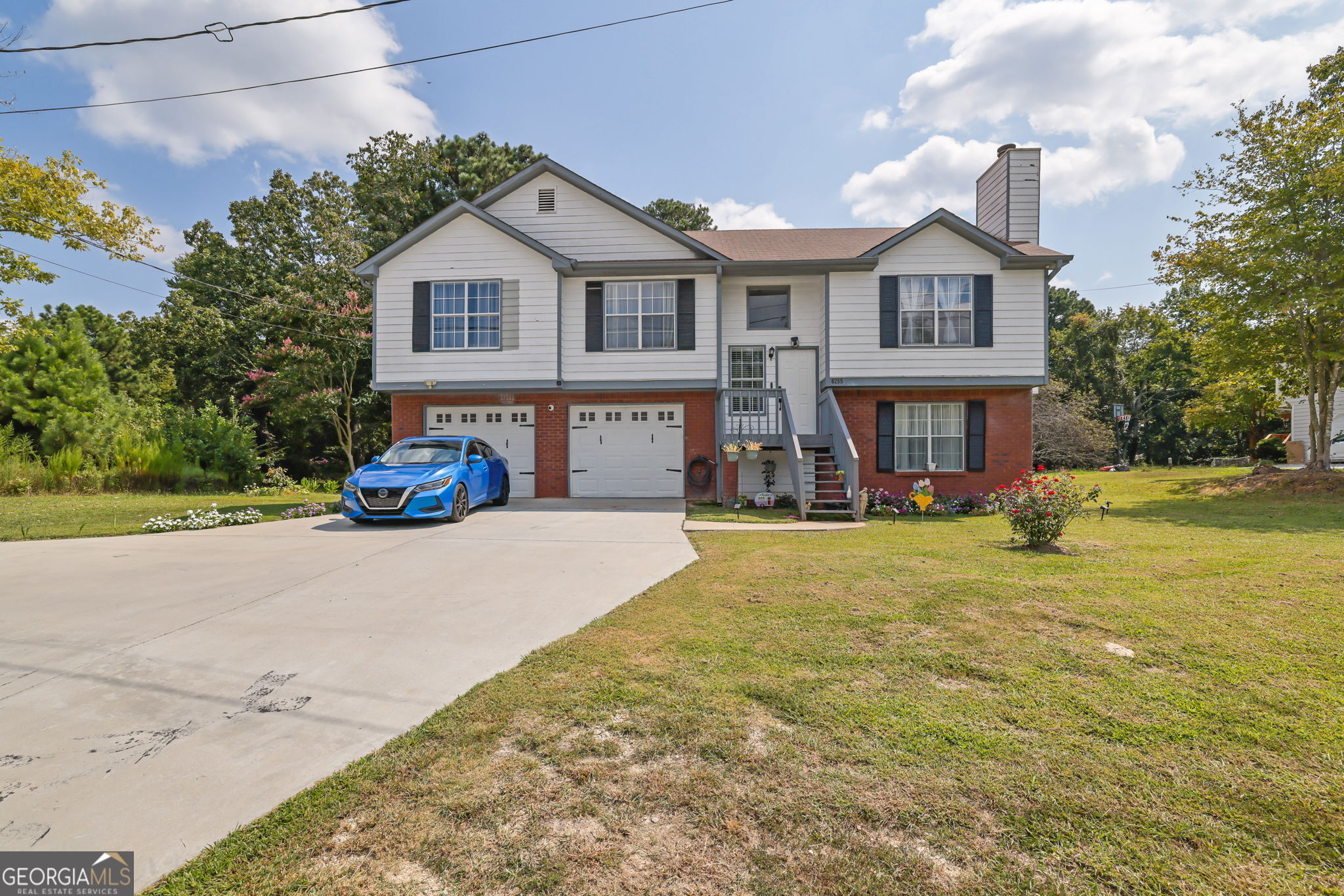 Nestled in the heart of Flowery Branch, this beautifully remodeled 4-bedroom, 3-bathroom home offers a perfect blend of modern updates and classic charm. With both a living room and a family room, there's plenty of space for relaxing and entertaining. The property features a versatile layout with a potential mother-in-law suite, making it ideal for multi-generational living or extra privacy. Situated on a large lot, the expansive yard provides endless possibilities for outdoor enjoyment or future expansion. Conveniently located near major roads, shopping, dining, and recreation, this home offers both comfort and convenience. Don't miss the chance to make this gem your own-schedule a tour today!