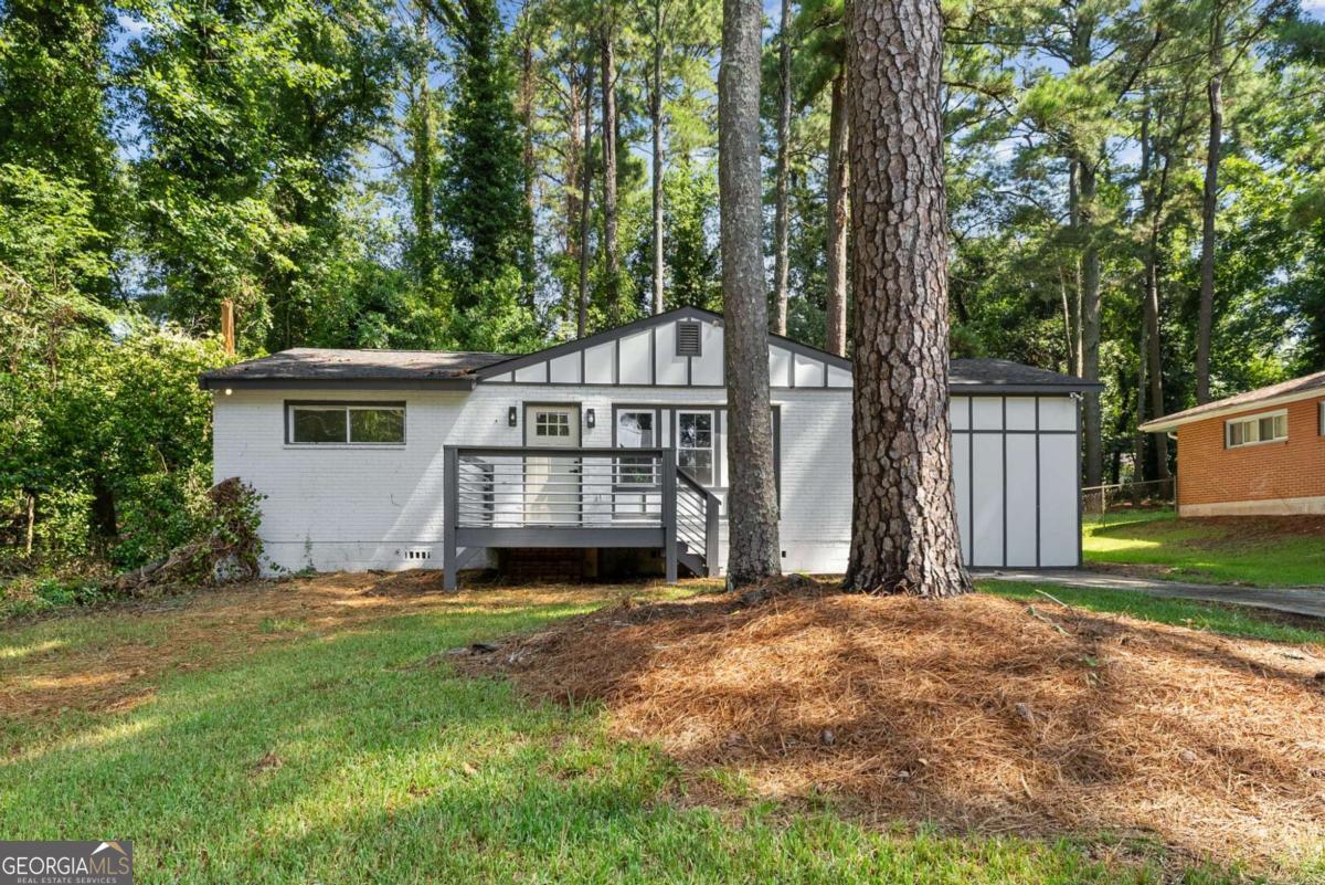 Welcome to your dream home, a meticulously fully renovated contemporary masterpiece nestled in a sought-after Decatur neighborhood. This 3-bedroom, 2-bathroom gem seamlessly blends modern design with warm, inviting living spaces, making it the perfect sanctuary for those who appreciate style and comfort. Key Features: Contemporary Design: Step inside and be captivated by the sleek lines, open floor plan, and abundance of natural light that define this modern retreat. Every detail, from the designer light fixtures to the high-end finishes, exudes sophistication and elegance. Chef's Kitchen: The heart of this home is a culinary enthusiast's dream, featuring state-of-the-art stone countertops, custom cabinetry, and a spacious island perfect for gathering with loved ones. Luxurious Bedrooms & Bathrooms: The three bedrooms are true havens of relaxation, each offering ample space, large windows, and a serene atmosphere. The master suite boasts a bathroom with a beautiful marble-look tile, a double vanity and a walk-in master closet. The Hall Bathroom offers a full size tub and high-end finishes. Outdoor Space: Step outside to your private backyard, a generously sized, ideal for entertaining, gardening, or simply enjoying the fresh air. The possibilities are endless! Decatur Living: Immerse yourself in the vibrant Decatur community, known for its eclectic shops, award-winning restaurants, and top-rated schools. With easy access to parks, trails, and major transportation routes, this home offers the perfect blend of convenience and charm. Do not miss your chance to own this exceptional property! Schedule a showing today and experience the epitome of modern living in Belvedere Park. BUYER'S CHOICE, SELLER PAYS $1,800 FOR STOVE & DISHWASHER