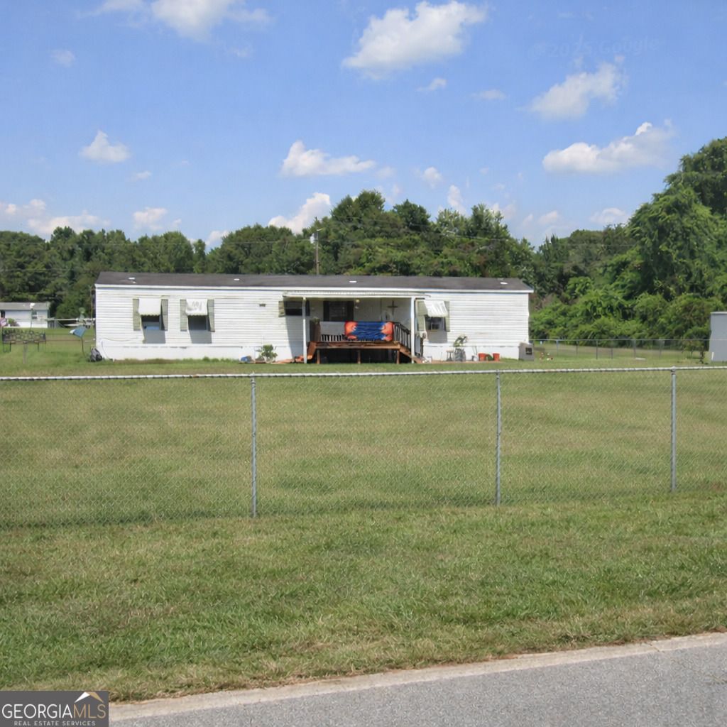 Photo of 213 Highway 3 N, Hampton, GA 30228 (MLS # 10735703)