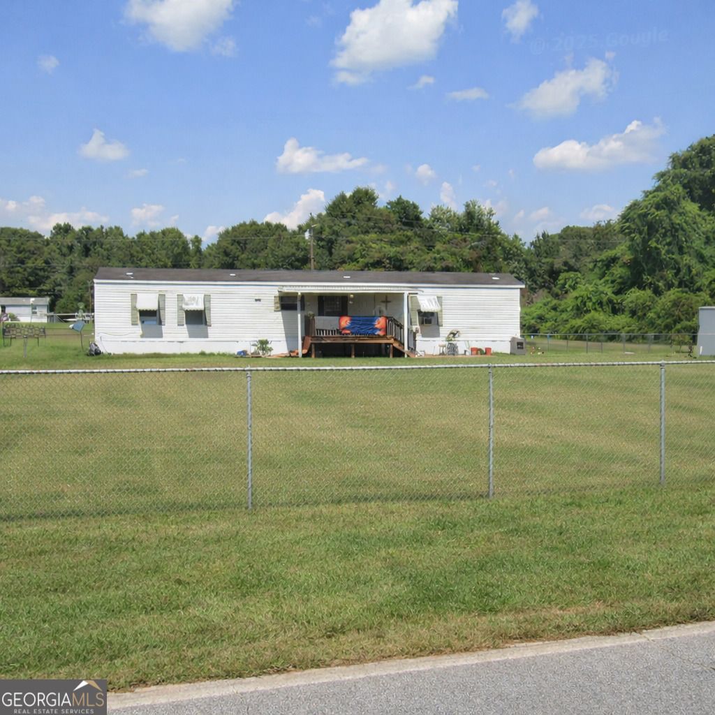 Photo of 213 Highway 3 N, Hampton, GA 30228 (MLS # 10735703)