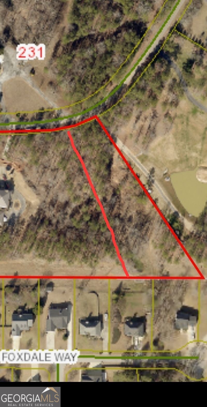 Exclusive 2 Acre Lot in North Paulding. Escape to this serene and private 2 acre lot surrounded by estate homes and lush woods. This land offers the perfect canvas to build your dream home. At the rear of the property, enjoy a tranquil spring-fed pond, enhancing the natural beauty of the land. Located adjacent to Richland Creek Reservoir where the areas master plan includes exciting future amenities such as walking trails, mountain bike trails, fishing docks and pedestrian spaces. The reservoir will lend to a vibrant and active lifestyle. Please note, the buyer is responsible for conducting their own surveys and soil test. This lot is part of a larger parcel and the renderings provided are approximations. Contact us today to schedule a tour and explore the potential of this exceptional property. Seller is willing to sell just 1 acre of the same tract.