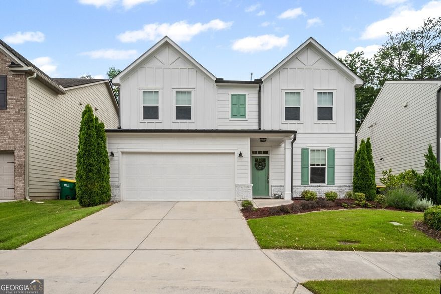 SELLER FINANCING AVAILABLE! Immaculate craftsman home with stunning upgrades, located just minutes from vibrant Downtown Woodstock. Nestled in the highly sought-after community of Riverside, this beautifully updated, move-in ready home offers the perfect blend of style, comfort, and convenience. Recent renovations include professionally landscaped front and backyards, fresh interior paint throughout, a remodeled fireplace surround, and newly updated flooring. These thoughtful upgrades give the home a clean, modern aesthetic. The chef's kitchen is a true showstopper, featuring white quartz countertops, custom white cabinetry that extends to the ceiling, an oversized walk-in pantry, a spacious island, and stainless steel appliances. The open-concept design creates an inviting space perfect for entertaining. The formal dining room is filled with charm, showcasing a custom chandelier and beautifully painted and stained hardwood floors. The spacious owner's suite provides a peaceful retreat with a large upgraded shower, modern double vanity, and a generous walk-in closet. Bathrooms throughout the home feature marble countertops and elegant Turkish tile flooring, adding both style and sophistication. Step outside to enjoy your private backyard oasis with a custom PaverStone style patio, a pergola, a level fenced yard, and a cozy fire pit. It is an ideal space for both relaxation and entertaining guests. The Riverside community offers exceptional amenities including a clubhouse, playground, community pool, kiddie pool, tennis courts, pickleball courts, and ample visitor parking. Enjoy a low-maintenance lifestyle in a vibrant and welcoming neighborhood. This is a rare opportunity to own a stylish and meticulously maintained home in one of Woodstock's most desirable communities.