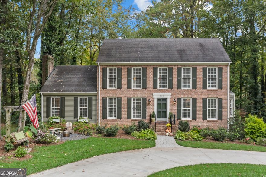 An absolute perfect "10" in beautiful Whitlock Heights. 4 bedrooms, 3 renovated baths in this traditional and totally renovated home. Professional design, high=end finishes throughout. Gorgeous open white kitchen featuring oversized island in Calcutta gold quartz, stunning Vermont Soap Stone counters plenty of cabinet space, and coffee bar. A gorgeous den off the kitchen with fireplace, another fantastic living space with built in window bench, custom bookshelves with library lights. Bedroom on main level with full bath. Fabulous screened porch with room for dining and seating overlooking private backyard. 3 bedrooms up, master features 2 closets, brand new carpet upstairs in the spacious bedrooms. 2 car garage with a large mudroom/entry way with custom built ins and safe. Huge family room downstairs with working fireplace, and also features a desk area in additionthe living/play space. Commercial grade circular driveway out front, with fire pit area, professional landscaping including power seeded yard. Absolutely beautiful and charming home, located in well established neighborhood. Close to square, interstate 75, parks and more. You do not want to miss this one.