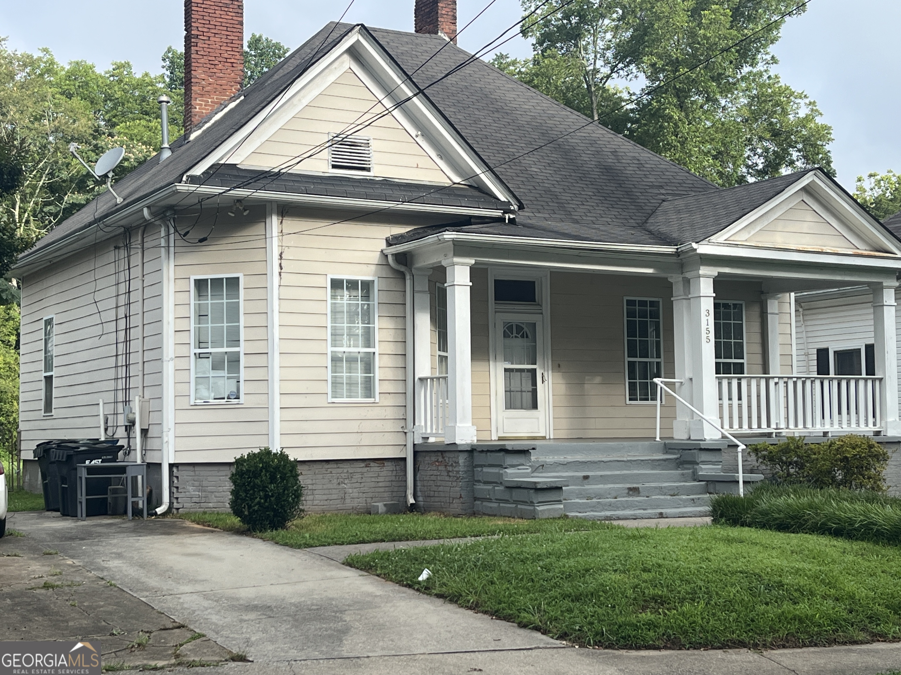 Charming three bedroom, two full bath bungalow located in historic Center Park community. The interior features high ceilings throughout, laminate wood flooring in foyer, hall, bedrooms, with tile flooring in kitchen, bathrooms, and laundry room. The kitchen is located at the rear of the home with a gas stove, dishwasher, and eat-in area. The laundry room with washer, dryer, and hot water heater is located off the kitchen. The exterior features a rocking chair front porch, shared driveway and on street parking, a rear deck, a large fenced in backyard, and a rear storage shed. Conveniently located to downtown East Point, midtown Atlanta, Hartsfield-Jackson International Airport, East Point Marta Station, Woodward Academy, major highways, local shopping, and entertainment.