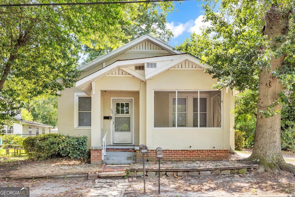 Situated on a peaceful street in the heart of Harrisburg, Augusta, this well-maintained detached duplex is an ideal find for savvy investors or those seeking an income-producing property. The front unit features a spacious 3-bedroom, 2-bathroom layout, complete with a dedicated laundry room, large back porch and plenty of natural light. The rear unit is a cozy and efficient 1-bedroom, 1-bathroom space, offering privacy and charm-perfect for a tenant, guest suite, or short-term rental. Outside, you'll find a carport and a shaded backyard with endless potential to expand your outdoor living area or create a relaxing garden retreat. Located just minutes from downtown, Augusta University, and the medical district, this property blends convenience, value, and future potential in one of Augusta's fastest-growing areas.
