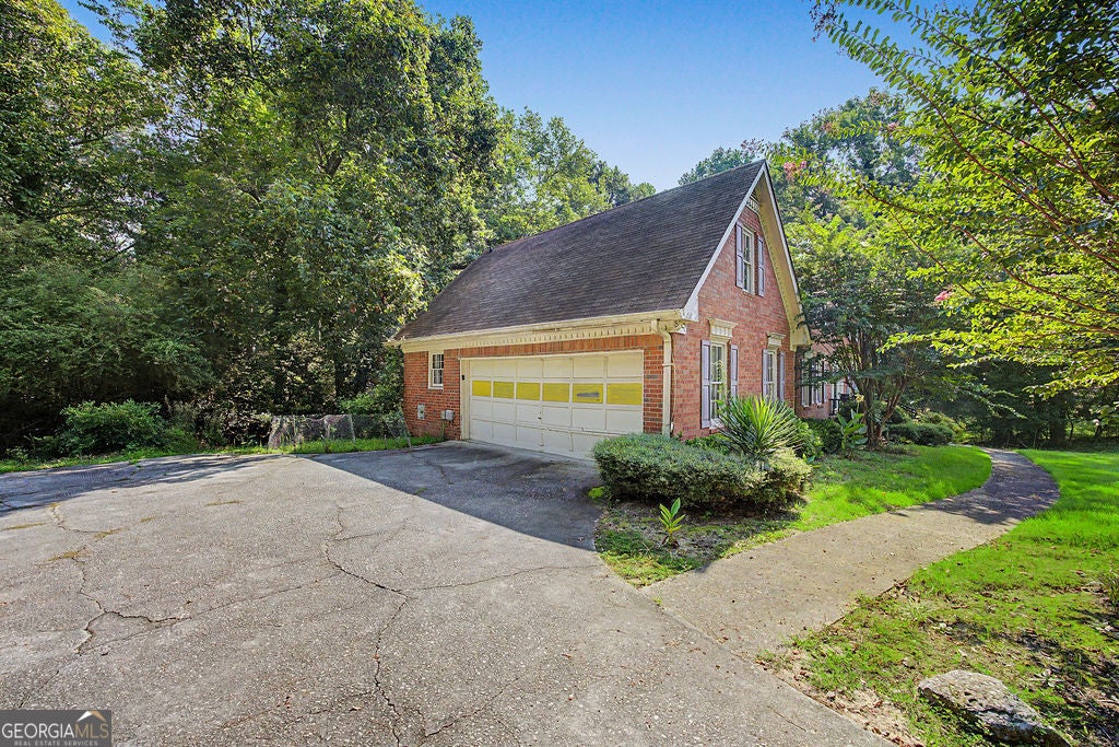 Photo of 2622 Travois Way SW, Lilburn, GA 30047 (MLS # 10836765)
