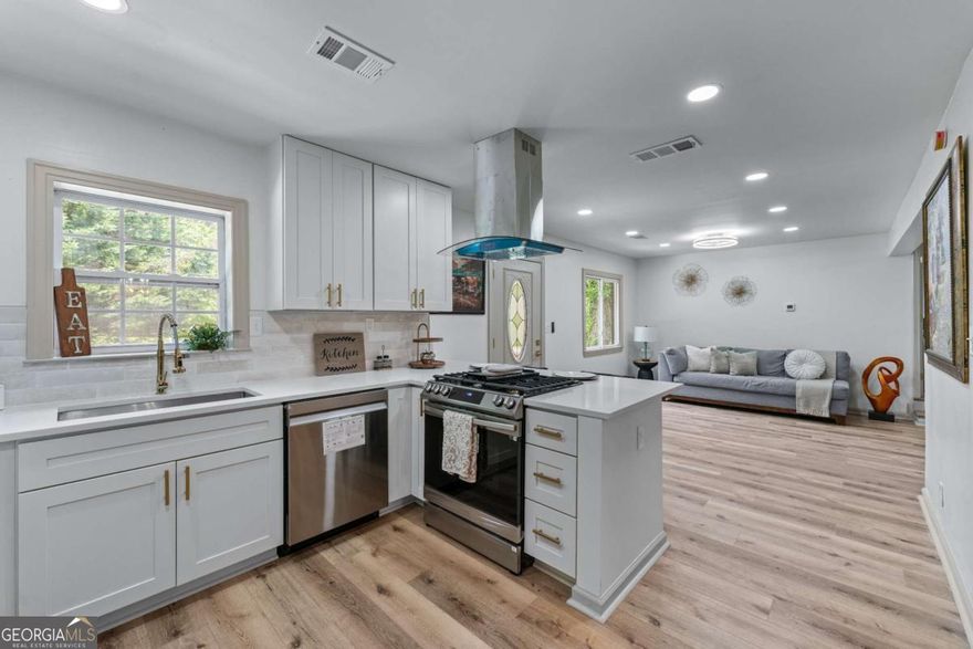 Imagine living in a fully renovated home with open, light-filled spaces that invites you to enjoy every corner. This gem in Marietta blends elegance, functionality, and a real opportunity to generate income from day one. It features a brand-new roof with a 35-year warranty, quartz countertops, luxury finishes, and a modern kitchen perfect for gatherings and daily living. Its spacious bedrooms provide the comfort anyone deserves, and the private suite with separate entrance, full bath, and laundry is ideal for rental income, hosting guests with privacy, or muti-generational living.. The main living area remains separate, offering control, tranquility, and flexibility. No HOA, ample parking, and a prime location near Truist Park, The Battery, I-75, Cumberland Mall, and Marietta Square. Perfect for individuals, small households, multi generation, or investors seeking monthly income. Live in comfort while your home pays for itself-don't miss this gem!