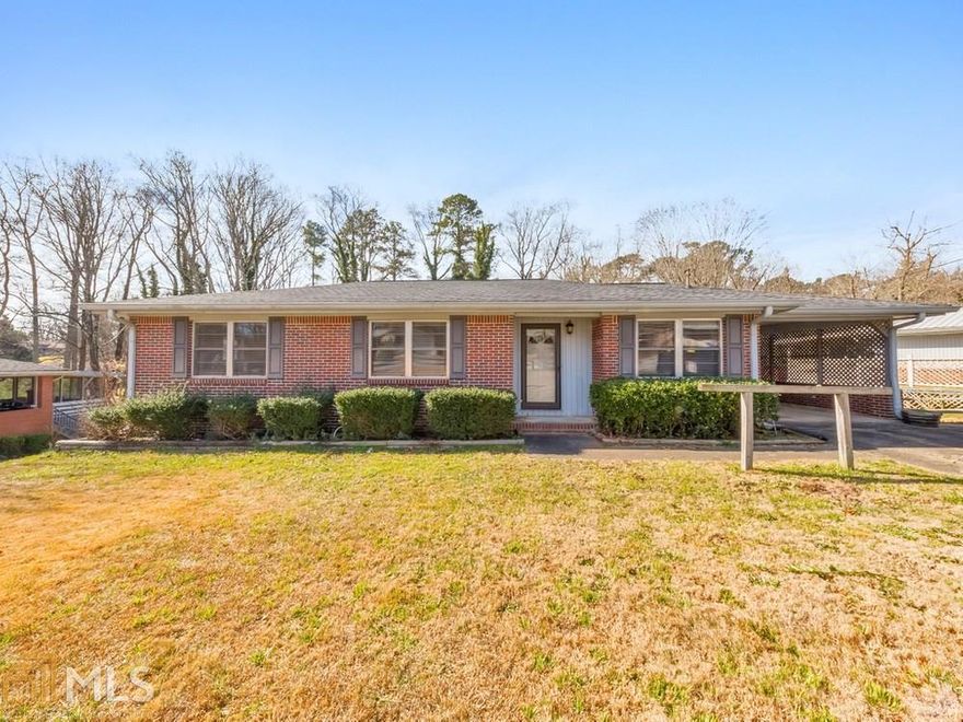 Well maintained 3 bed / 1.5 bath ranch in Lithia Springs! This 4-sided brick home features a cozy den, spacious eat-in kitchen, and an oversized screened porch! Master bedroom has an attached half bathroom! Two inviting secondary bedrooms share a full bathroom! Full, partially finished basement offers a built-in bar and second living area, perfect for entertaining! Attached carport with additional covered parking!  Expansive, fenced backyard with a large storage shed! Located in a well-established neighborhood with plenty of opportunity to make it your own!