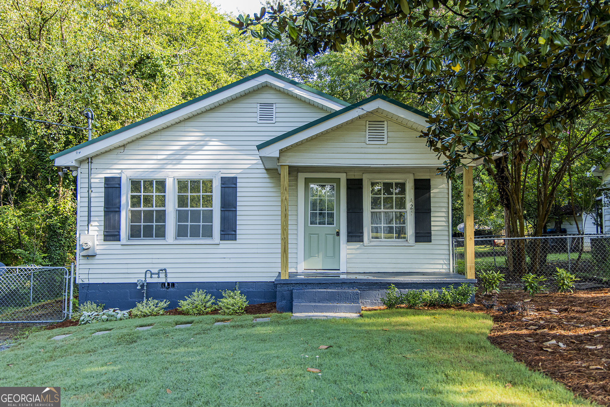 **Charming Updated Home!** This move-in ready home features fresh updates throughout, including new floor coverings, kitchen cabinets, countertops, appliances, and a stylish bathroom vanity. Enjoy a bright and inviting layout with modern finishes, a welcoming front porch, and a brand-new back deck perfect for entertaining. Conveniently located with a spacious yard, this home blends classic charm with modern upgrades.